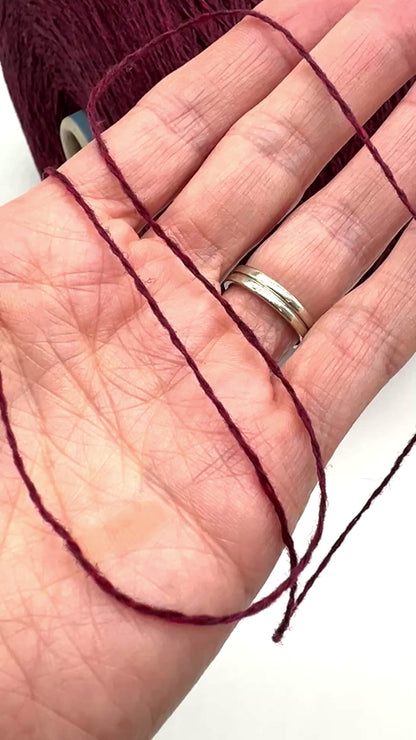 Elegant iDOKNiT SESIA SCOTLAND 100% Extrafine Merino Tweed lace yarn in Nm 2/14, showcasing a sophisticated rustic speckled texture and premium Italian wool quality.