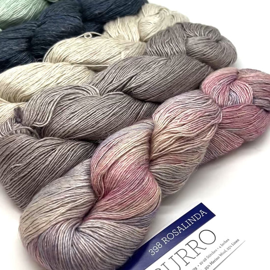 Premium iDOKNiT DK Sport weight yarn, SUSURRO by Malabrigo Peru. Luxury blend of 50% mulberry silk, 25% merino wool, and 25% linen, 297m/100g. Hand-dyed authentic Peruvian yarn curated by iDOKNiT for lightweight garments with elegant drape and sophisticated linen texture.