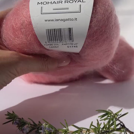 Close-up of iDOKNiT Lana Gatto MOHAIR ROYAL yarn, highlighting the delicate airy halo of Kid Mohair and Extrafine Merino blend in a 25g ball.