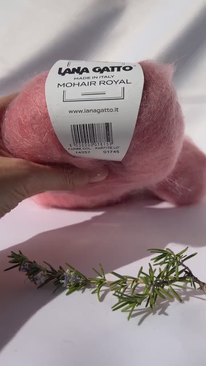 Close-up of iDOKNiT Lana Gatto MOHAIR ROYAL yarn, highlighting the delicate airy halo of Kid Mohair and Extrafine Merino blend in a 25g ball.