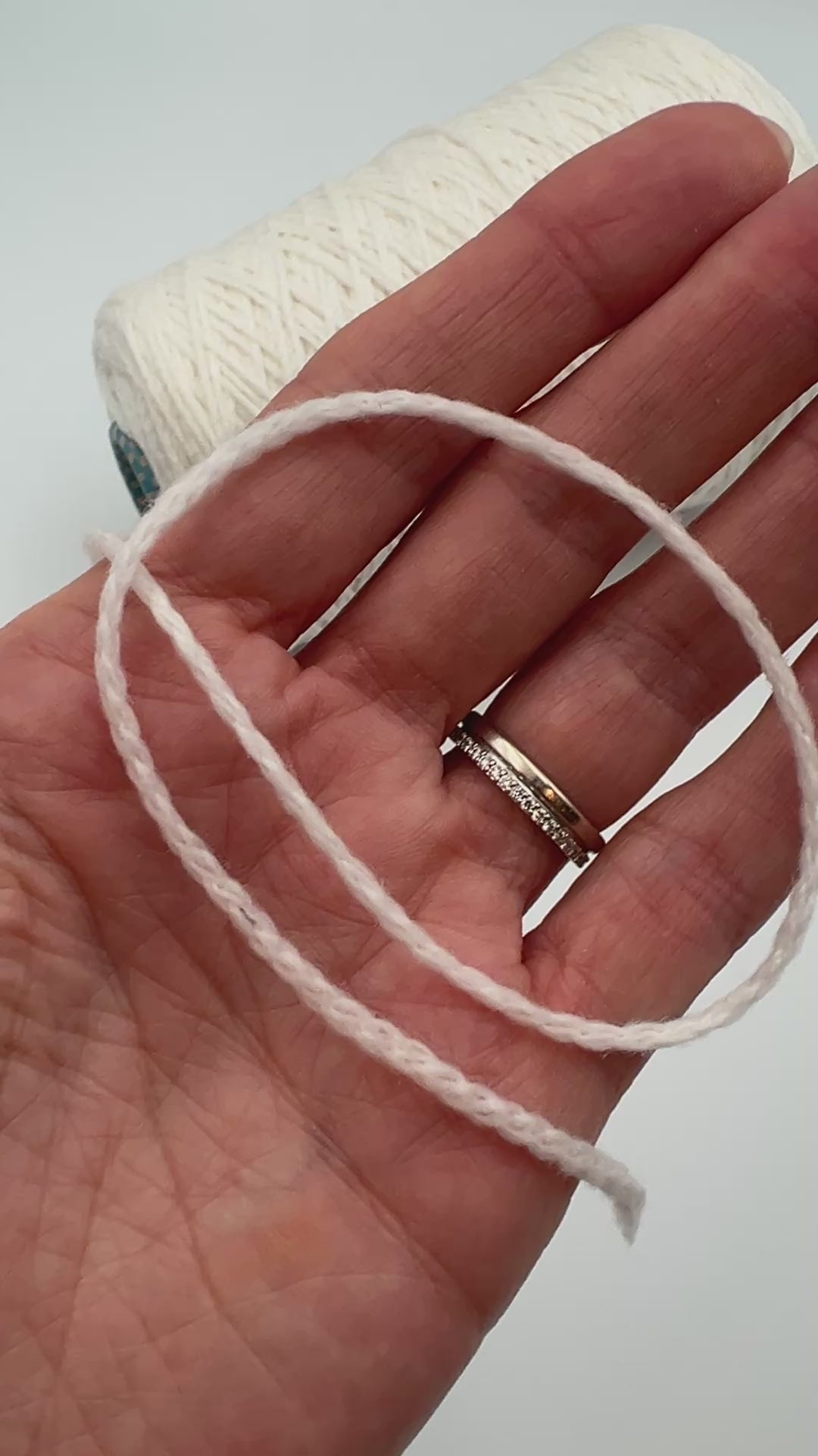 Rare CARIAGGI PIUMA 100% cashmere chainette yarn on original mill cone with original label and lofty cashmere texture.