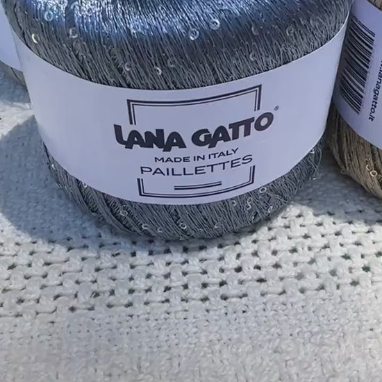 Lana Gatto Paillettes yarn in shimmering pastel tones, with delicate 2mm sequins, lightweight polyester yarn ideal for adding sparkle to knit or crochet projects. Made in Italy. 
