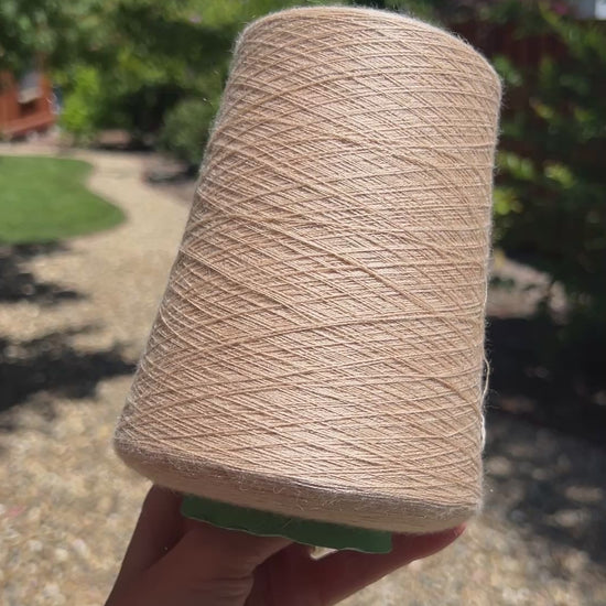 Rare vicuña silk yarn by Cariaggi on original luxury Italian cone
Cariaggi LAUREA 70 vicuña 30 silk couture lace yarn
Luxury Italian vicuña yarn close up showing ultra fine texture
Collector level vicuña silk yarn for weaving and couture knitting
Extremely rare Italian vicuña silk lace yarn on industrial cone