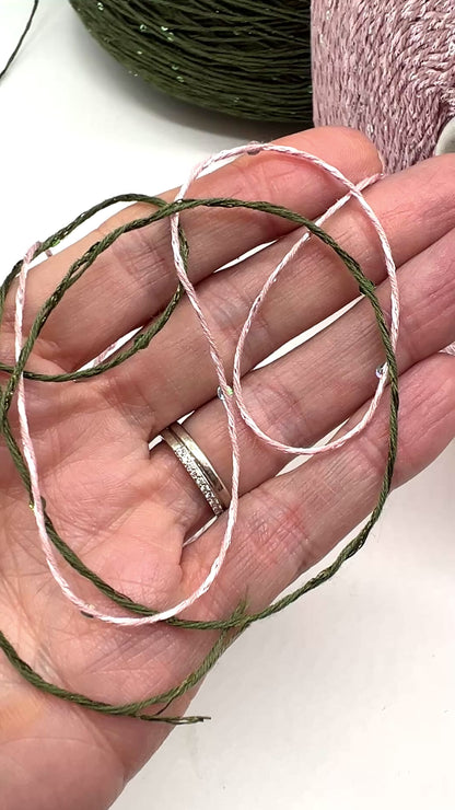 Professional grade RiGo STELLATO sport weight yarn from iDOKNiT, featuring a sophisticated 60% Italian cotton base with 2mm integrated paillettes. This authentic Italian-made yarn is curated by iDOKNiT to provide a refined shimmer and luxury finish for elegant, high-performance knitting projects.