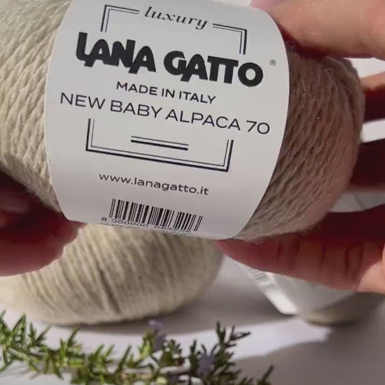 Luxurious iDOKNiT Italian yarn blend of 70% Baby Alpaca and 30% Extrafine Merino Wool in DK weight, featuring a soft halo and plush texture for elegant knitwear.