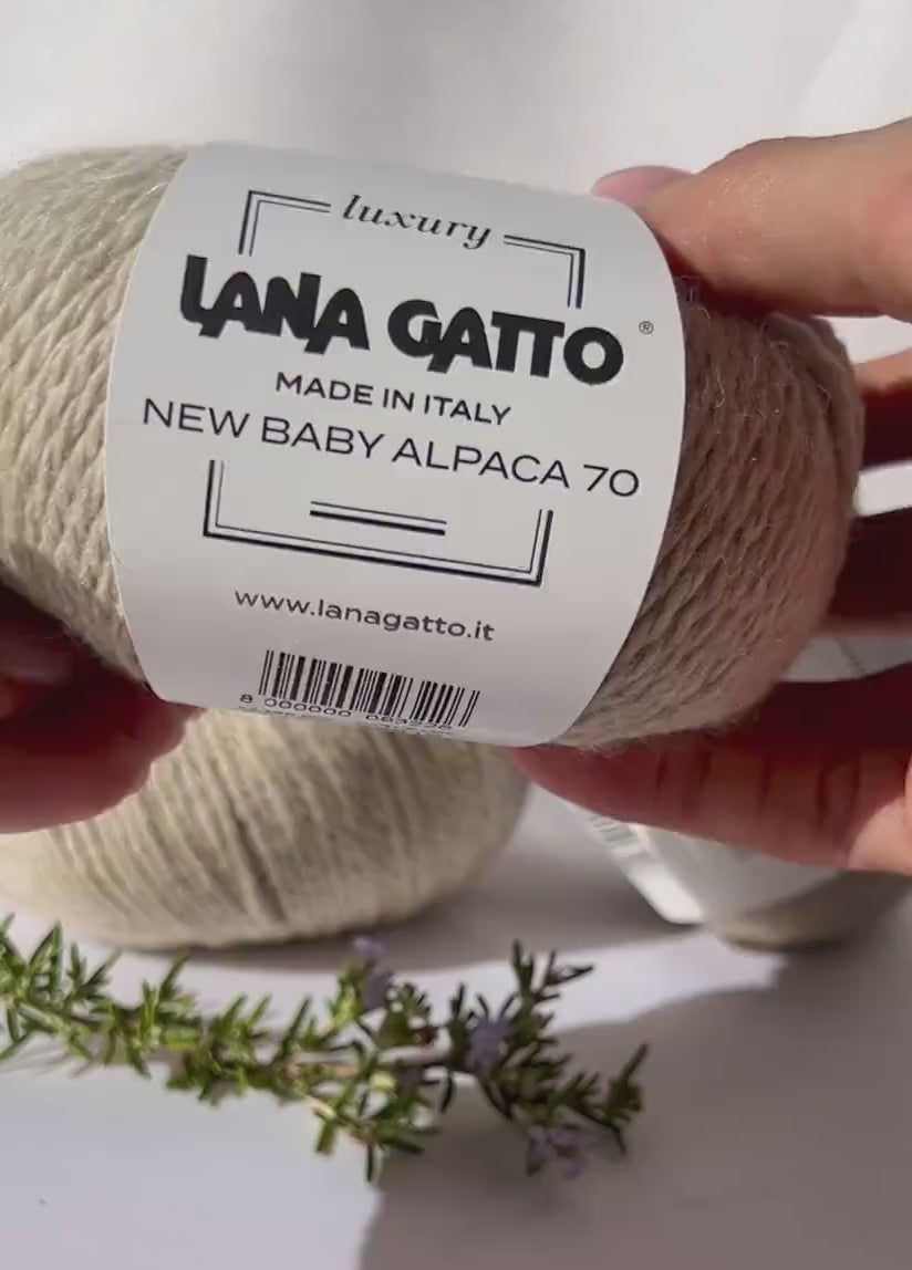 Luxurious iDOKNiT Italian yarn blend of 70% Baby Alpaca and 30% Extrafine Merino Wool in DK weight, featuring a soft halo and plush texture for elegant knitwear.