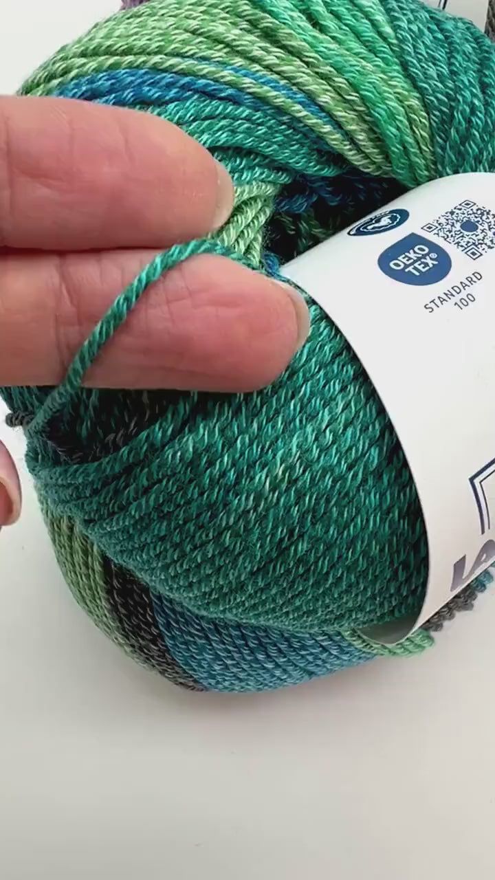 Exclusive iDOKNiT sport weight yarn, Gradient MERINOCOT by Lana Gatto Italy. A premium Italian-made blend of 53% merino wool and 47% cotton featuring a smooth gradient color transition. Providing 125m per 50g ball, this luxury fiber is curated by iDOKNiT for breathable, soft, and artistic garments with natural depth across all seasons.