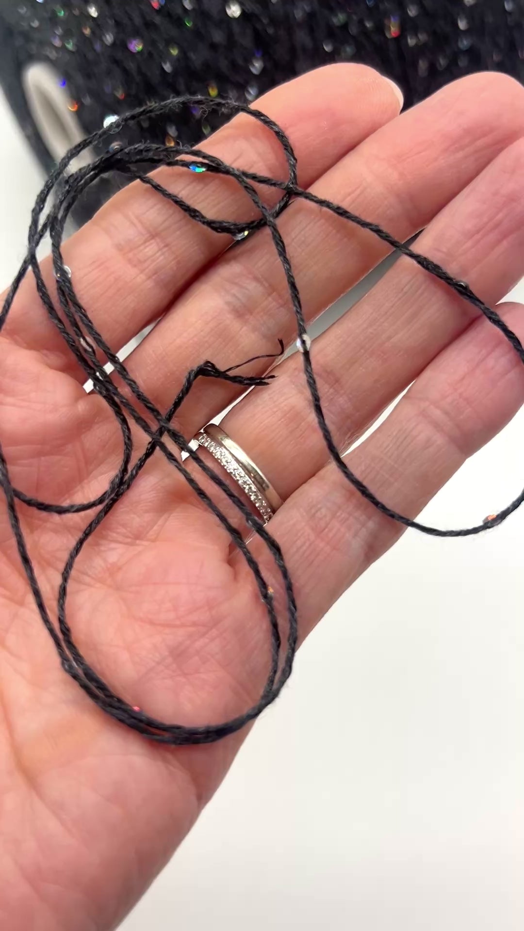 Professional grade RiGo STELLATO sport weight yarn from iDOKNiT, featuring a sophisticated 60% Italian cotton base with 2mm integrated paillettes. This authentic Italian-made yarn is curated by iDOKNiT to provide a refined shimmer and luxury finish for elegant, high-performance knitting projects.