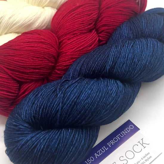 Premium iDOKNiT fingering weight yarn, ULTIMATE SOCK by Malabrigo Peru. Durable blend of 75% superwash merino wool and 25% nylon, 385m/100g. Hand-dyed authentic Peruvian yarn curated by iDOKNiT for resilient socks, garments, and shawls with superior 4-ply stitch definition.