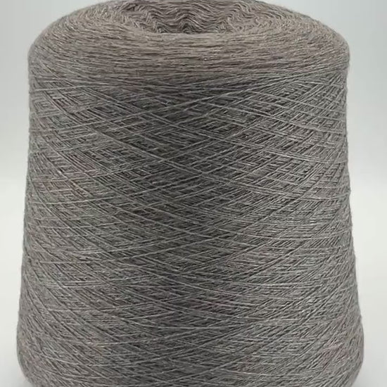 Loro Piana 100% Extra Fine Cashmere lace yarn (2/27 Nm) on a professional cone. Shown in classic neutral shades including Light Camel, Sand Melange, and Ivory. Made in Italy. Available at iDOKNiT.com.