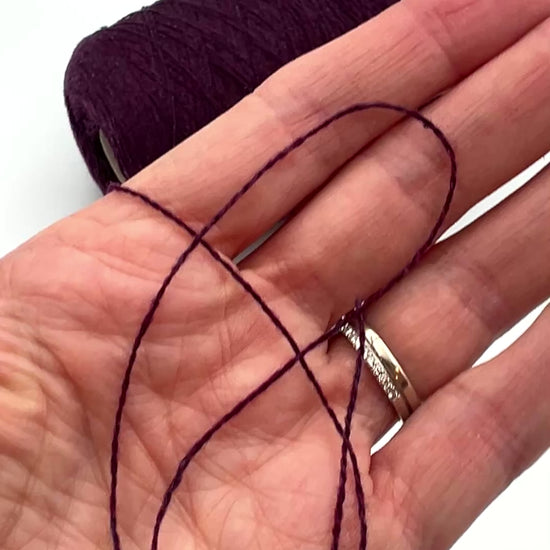 Loro Piana 50 percent baby vicuna 50 percent cashmere Italian ultra-fine lace yarn on original cone in Violetto Melange from iDOKNiT