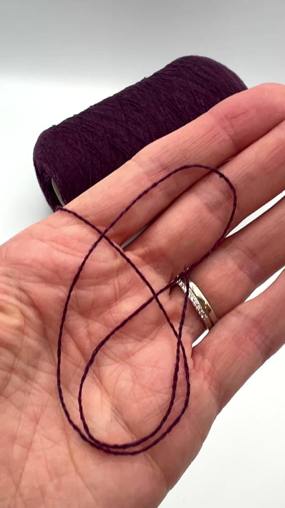 Loro Piana 50 percent baby vicuna 50 percent cashmere Italian ultra-fine lace yarn on original cone in Violetto Melange from iDOKNiT