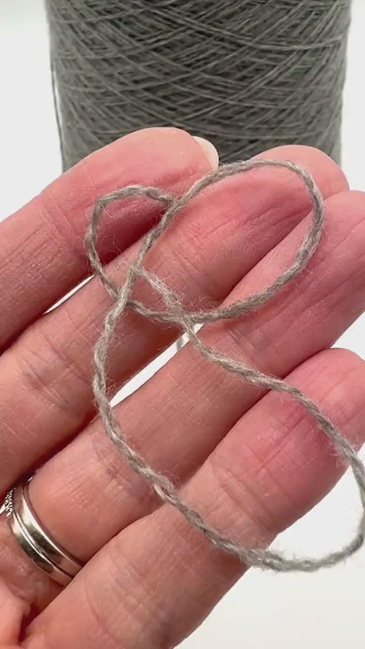Luxury Italian cashmere yarn CASH LIGHT FINE 850m
100 percent cashmere lace light fingering yarn cone Italy
soft Italian cashmere yarn for sweaters shawls and scarves
premium cashmere yarn close up texture detail
luxury knitting weaving crochet cashmere yarn cone