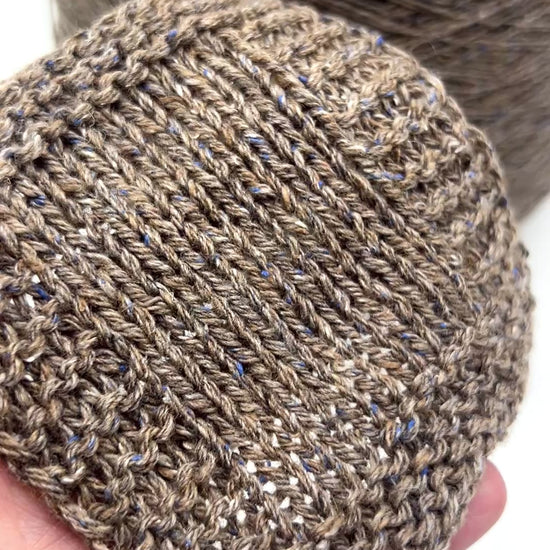 Exclusive iDOKNiT lace weight tweed yarn, PIGALLE by RiGo Italy. A complex luxury blend of 40% virgin wool, 20% silk, and 15% viscose, 750m/100g. Authentic Italian-made tweed with sophisticated multi-fiber texture and subtle silk sheen, curated by iDOKNiT for high-end, lightweight knitwear.