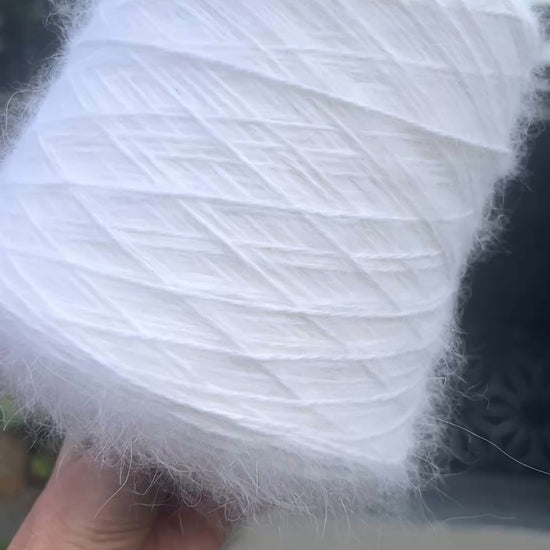 Italian Angora blend yarn by Biagioli Modesto with soft halo and lightweight texture, sport weight yarn for sweaters and accessories, sold by iDOKNiT