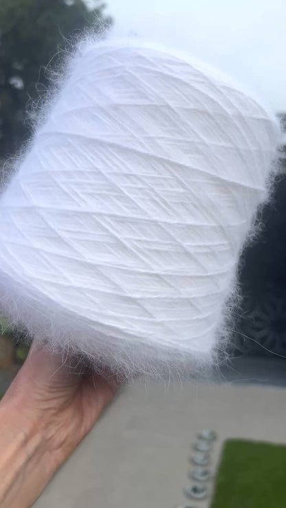 Italian Angora blend yarn by Biagioli Modesto with soft halo and lightweight texture, sport weight yarn for sweaters and accessories, sold by iDOKNiT