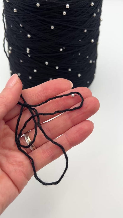 G&G Filati BON-BON luxury 100% merino wool single ply sport weight yarn featuring integrated, generously spaced perline pearl beads wound on an industrial cone for high-end boutique knitwear.
