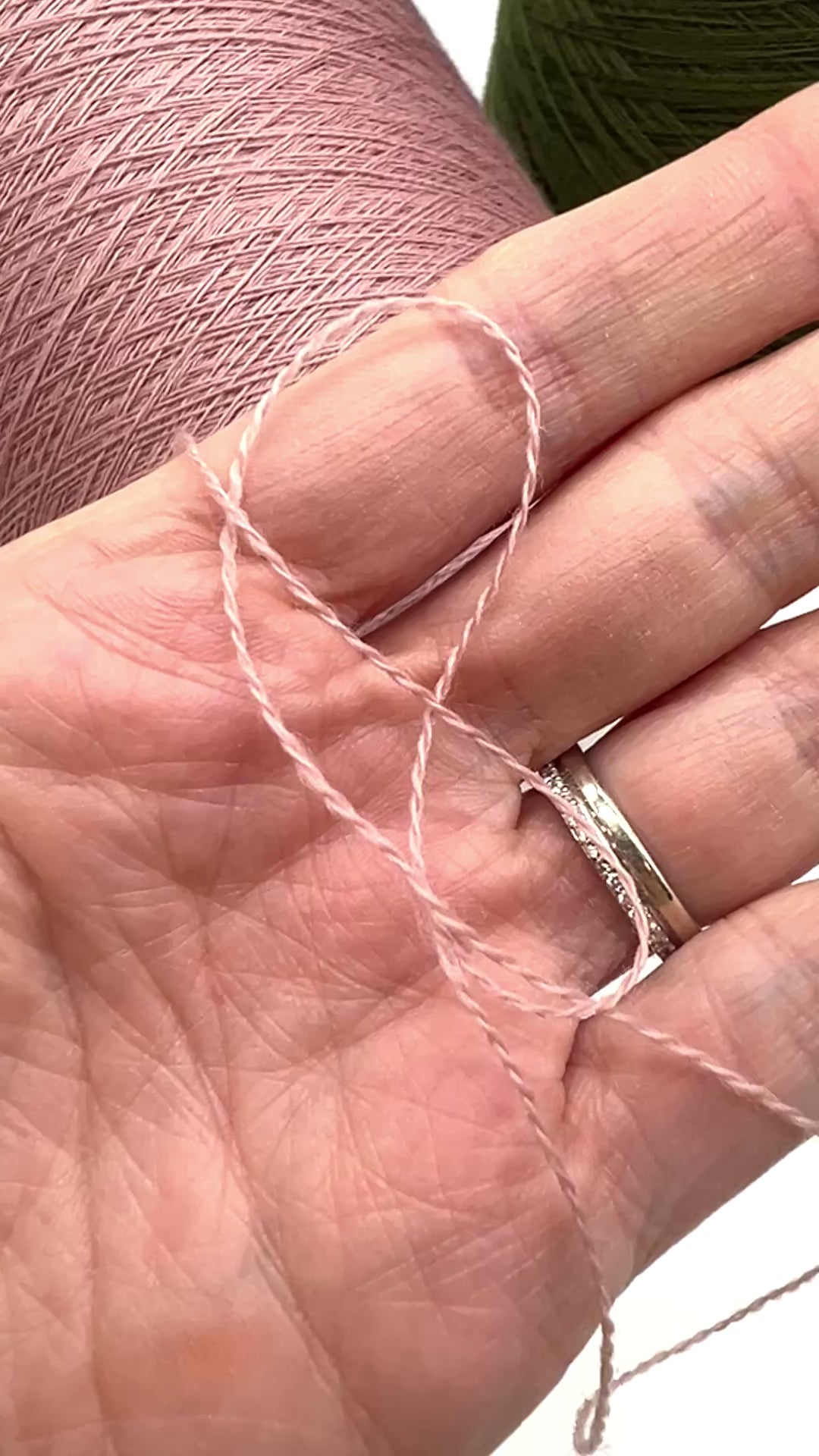 Premium iDOKNiT RiGo JASMINE 100% Extrafine Merino lace weight yarn in Nm 2/30, showcasing the elegant drape and superior Italian wool quality for luxury lace knitting.