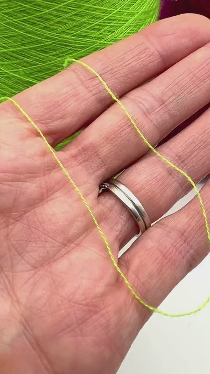 Ultra-fine 100% combed cashmere lace yarn SUPER CASHMERE by Loro Piana on cone, made in Italy. Rare luxury cashmere yarn with exceptional softness, strength, and elegant drape, curated by iDOKNiT for high-end knitting and weaving.