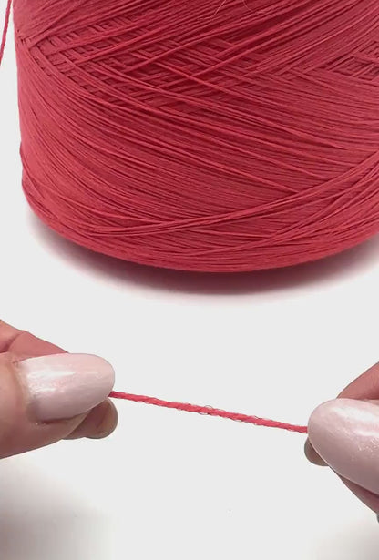PARK MICRO cotton elastane chain yarn coral Italy
Italian stretch cotton yarn 900m per 100g
LE TRICOT coral chain yarn for tops dresses and crochet
Stretch lace weight cotton yarn close up texture detail
Italian cotton elastane yarn for machine knitting and fashion knitwear