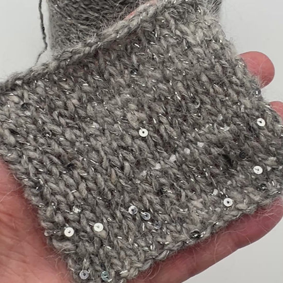 Wool mohair lurex sequin yarn NELSON with Italian fashion texture
Luxury Italian DK yarn with 2mm paillettes and soft mohair halo
Industria Italiana Filati NELSON yarn close up with shimmer
Wool mohair sparkle yarn for sweaters cardigans and scarves
Italian fashion yarn with lurex paillettes and textured halo