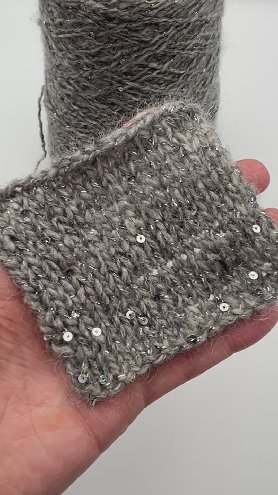 Wool mohair lurex sequin yarn NELSON with Italian fashion texture
Luxury Italian DK yarn with 2mm paillettes and soft mohair halo
Industria Italiana Filati NELSON yarn close up with shimmer
Wool mohair sparkle yarn for sweaters cardigans and scarves
Italian fashion yarn with lurex paillettes and textured halo