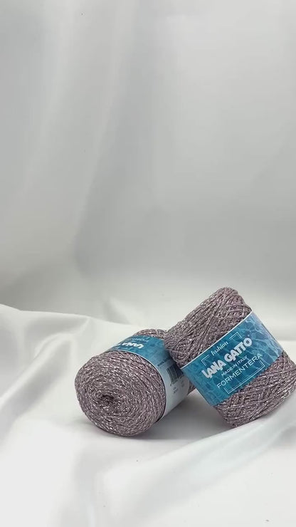 Luxury Italian designer yarn collection for iDOKNiT, featuring premium natural fibers on cones for professional hand-knit and machine-knitting projects.