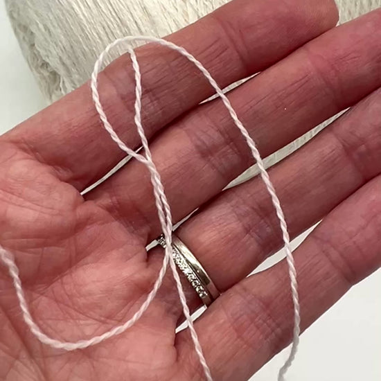 Elite iDOKNiT extra fine lace weight yarn, MASCOTTE by RiGo Italy. Luxury blend of 20% cashmere and 80% merino wool, Nm 2/30, providing 1500m per 100g. Authentic Italian-made yarn in 2153 Ecru Natural, curated by iDOKNiT for delicate lace knitting and high-end, ultra-soft garments.