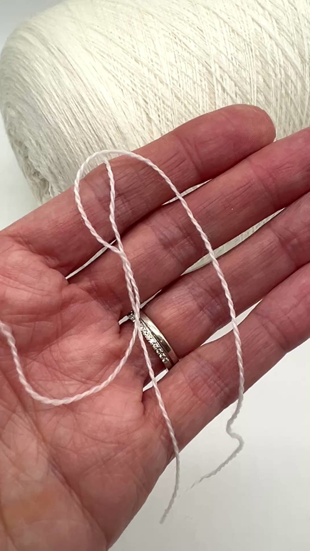Elite iDOKNiT extra fine lace weight yarn, MASCOTTE by RiGo Italy. Luxury blend of 20% cashmere and 80% merino wool, Nm 2/30, providing 1500m per 100g. Authentic Italian-made yarn in 2153 Ecru Natural, curated by iDOKNiT for delicate lace knitting and high-end, ultra-soft garments.
