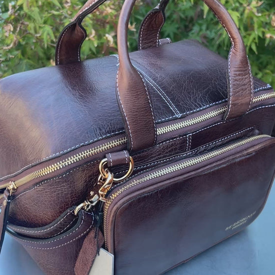 RE PROJECT 39 handcrafted Urban Leather knitting and crochet crossbody bag with top handles and front pocket from iDOKNiT