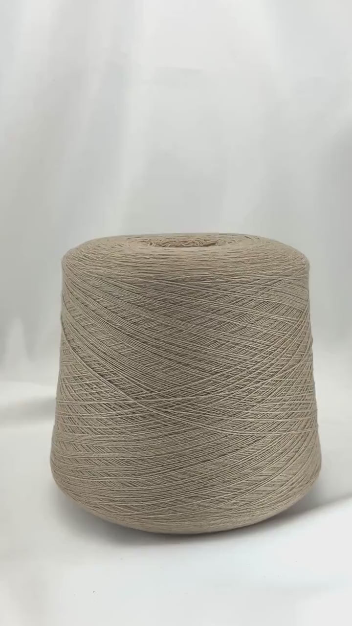 Cashmere merino yarn LEGEND 70 luxury Italian lace weight yarn
Soft Italian cashmere merino yarn cone for sweaters and shawls
Luxury lace weight yarn made from cashmere and merino wool
Italian cashmere merino knitting yarn close up texture detail
Luxury Italian yarn for heirloom knitwear and weaving