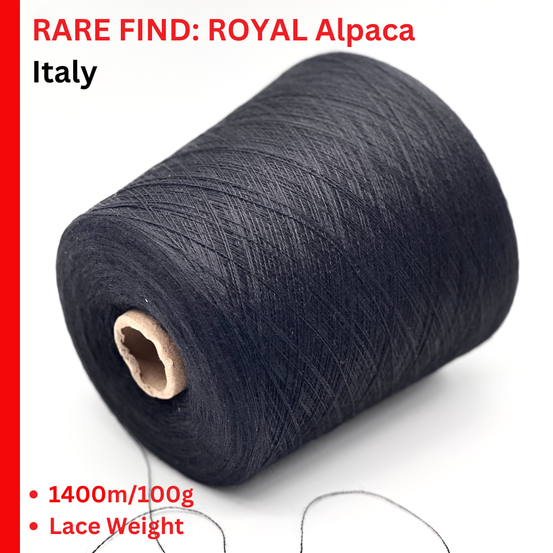 Roll of black yarn with text about Royal Alpaca Italy on a white background